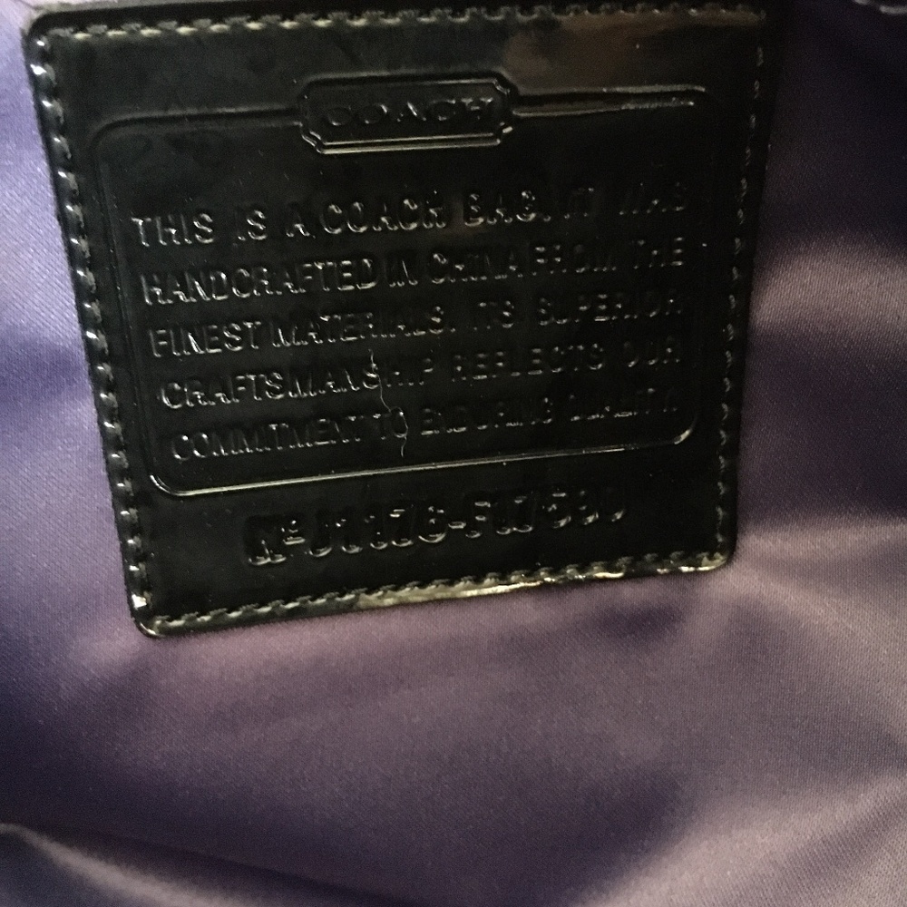 Coach diaper bag with mat